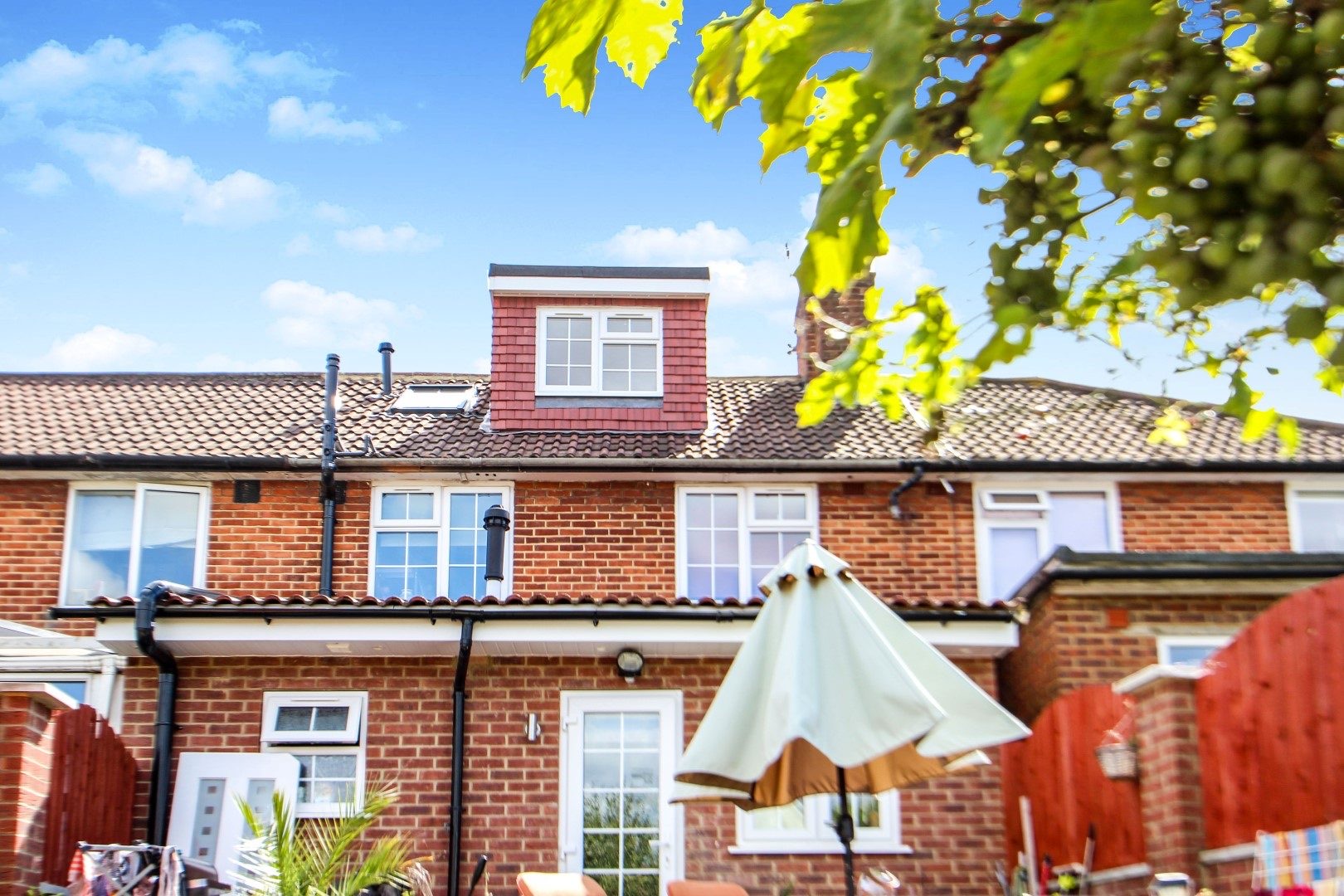 Rear garden view of loft extension