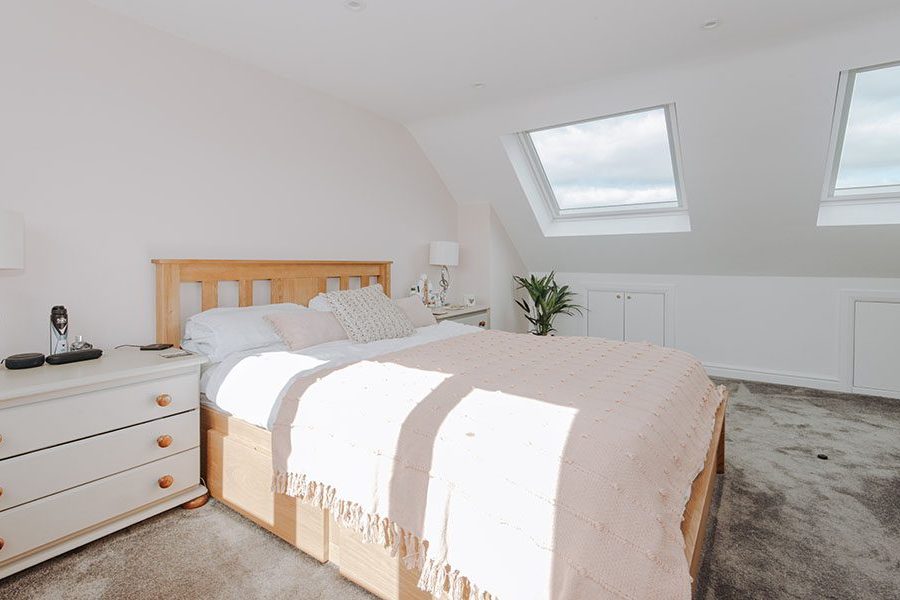 Isleworth loft conversion bedroom side