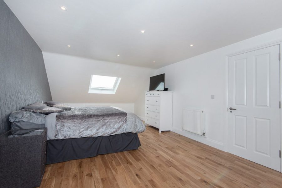 Hip to Gable Dormer loft extension in Thornton Heath bedroom alt 2