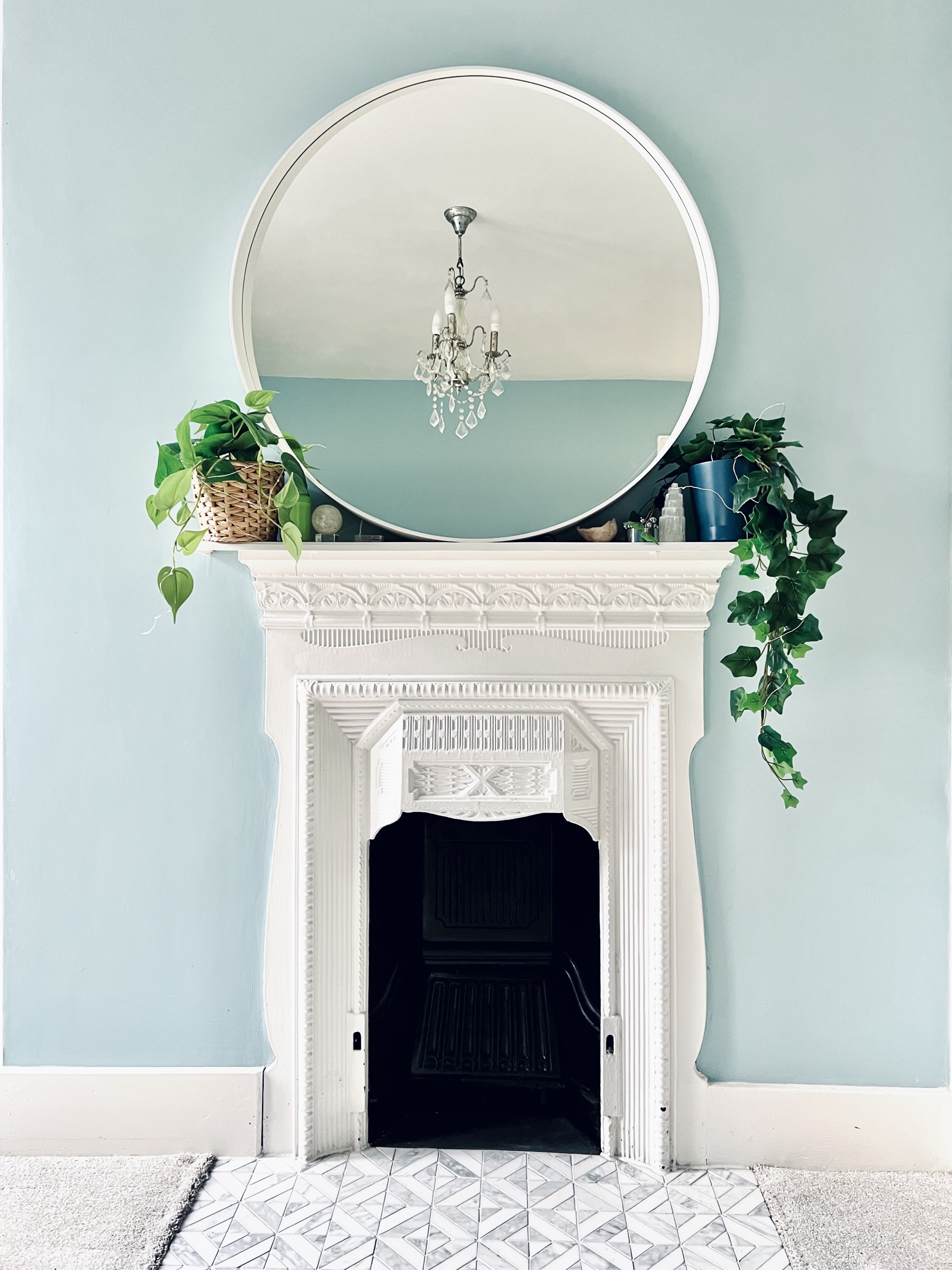 Mirror over a fireplace