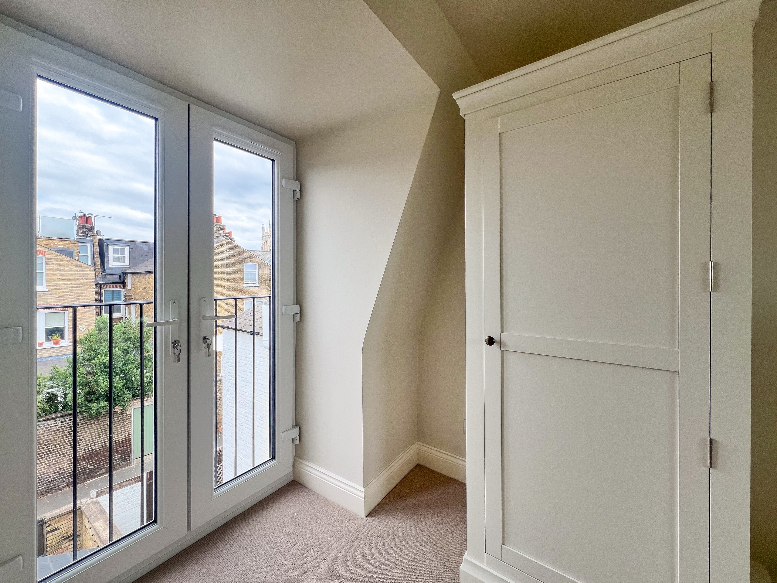 L-Shaped Mansard Loft Extension In Battersea
