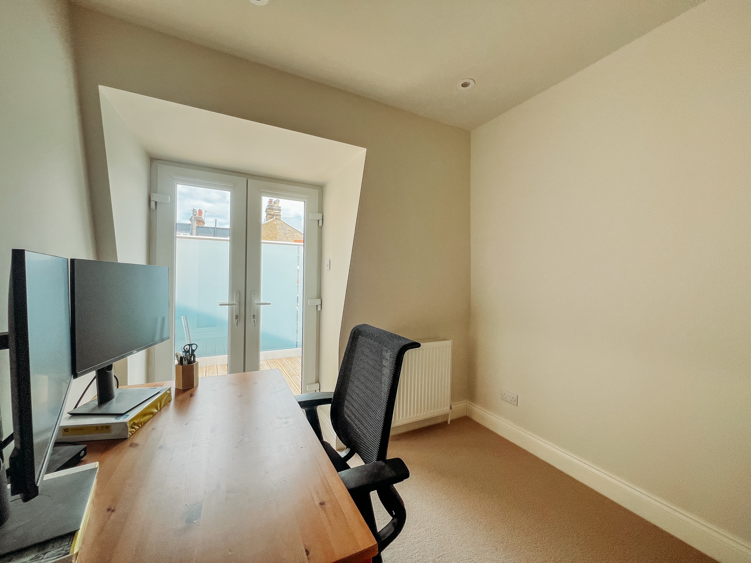 L-Shaped Mansard Loft Extension In Battersea